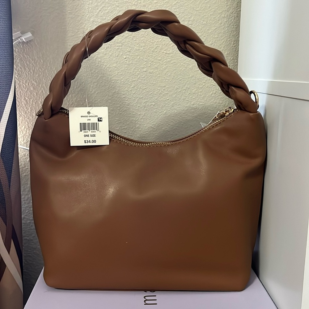 Cognac colored faux leather braided strap purse with crossbody strap